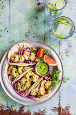 No boring tacos here! These Orange Shrimp Tacos from https://meatified.com are spiced with ginger, piled high with a crunchy, punchy slaw, finished with a rich avocado cream & held together with a grain free tortilla.