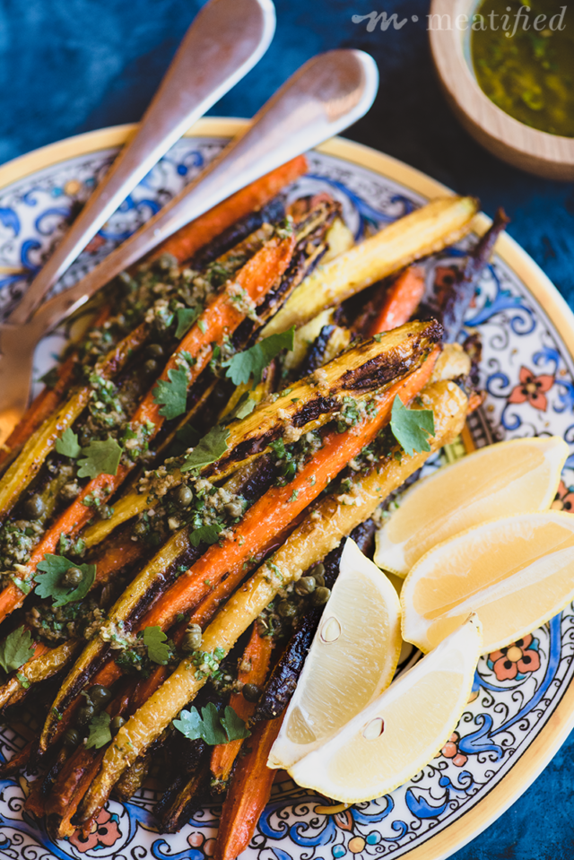 Liven up your roasted vegetables with this punchy green olive dressing! It's quick and easy, pairing perfectly with these caramelized roasted carrots from http://meatified.com.