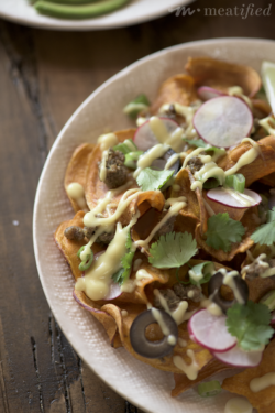 These really are the Ultimate Loaded Nachos! Crispy, crunchy, creamy, gooey, flavorful and fresh all combine to make these AIP and allergy friendly nachos from http://meatified.com.