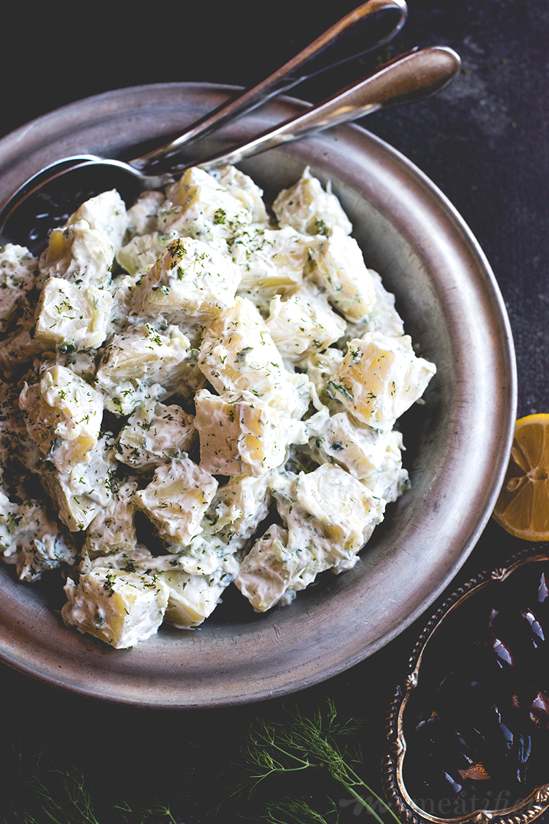Cool and creamy tzatziki meets white sweet potatoes to make this simple, summery & nightshade free tzatziki potato salad from http://meatified.com. It's the perfect side for grilling!