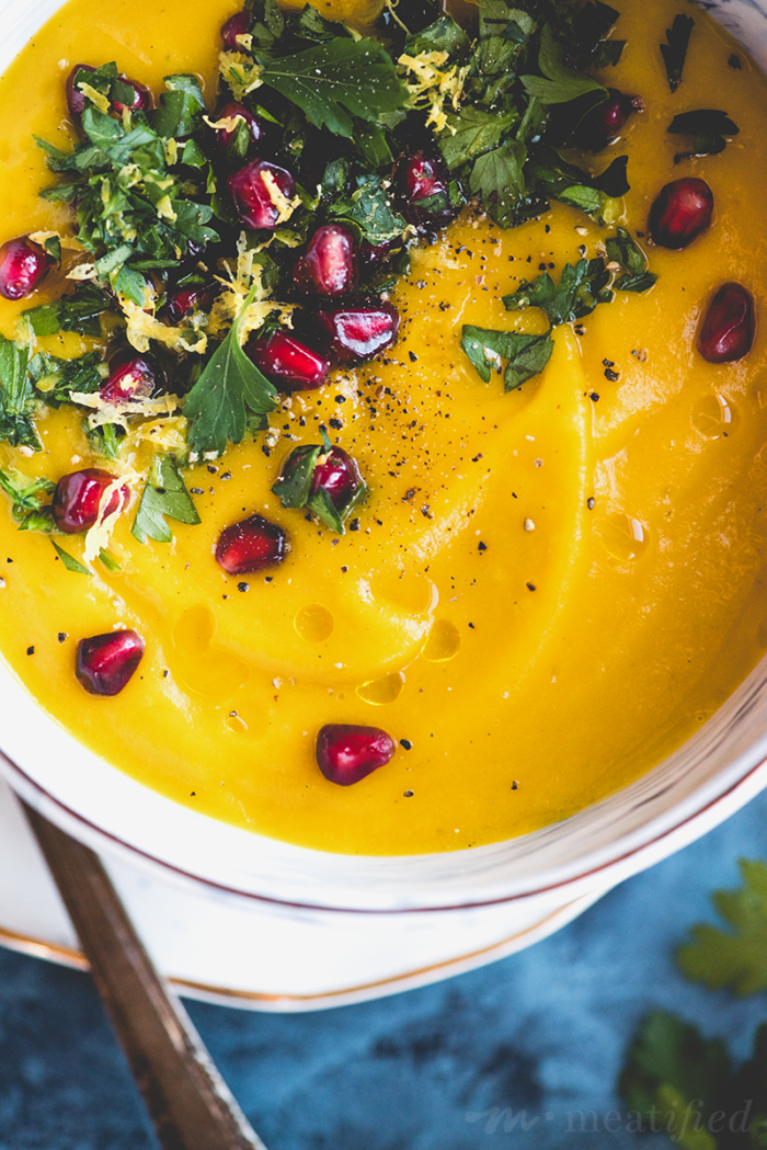 This butternut apple soup from https://meatified.com is creamy without any dairy & topped with a crunchy tart pomegranate gremolata to add a touch of freshness to this fall favorite.