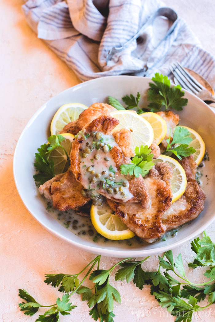 No chicken here! This gluten & grain free Pork Piccata from https://meatified.com swaps out the usual chicken for golden & tender pork paired with a light & bright lemon caper sauce.
