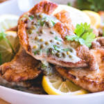 No chicken here! This gluten & grain free Pork Piccata from https://meatified.com swaps out the usual chicken for golden & tender pork paired with a light & bright lemon caper sauce.