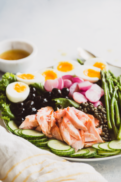 Switch things up with this springtime take on salmon nicoise salad from https://meatified.com, featuring poached radishes, tender asparagus & a punchy lemon shallot dressing.