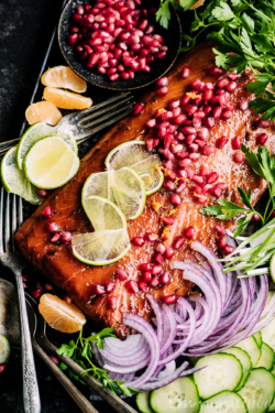 This simple pomegranate glazed salmon from https://meatified.com is quick to the table & a fun twist on typical weeknight baked salmon with its sweet-tart, ginger laced glaze.