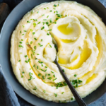 One simple trick from https://meatified.com makes the creamiest cauliflower mash, with a hint of sweetness & a more potato-like texture, finished with plenty of garlic & chives.