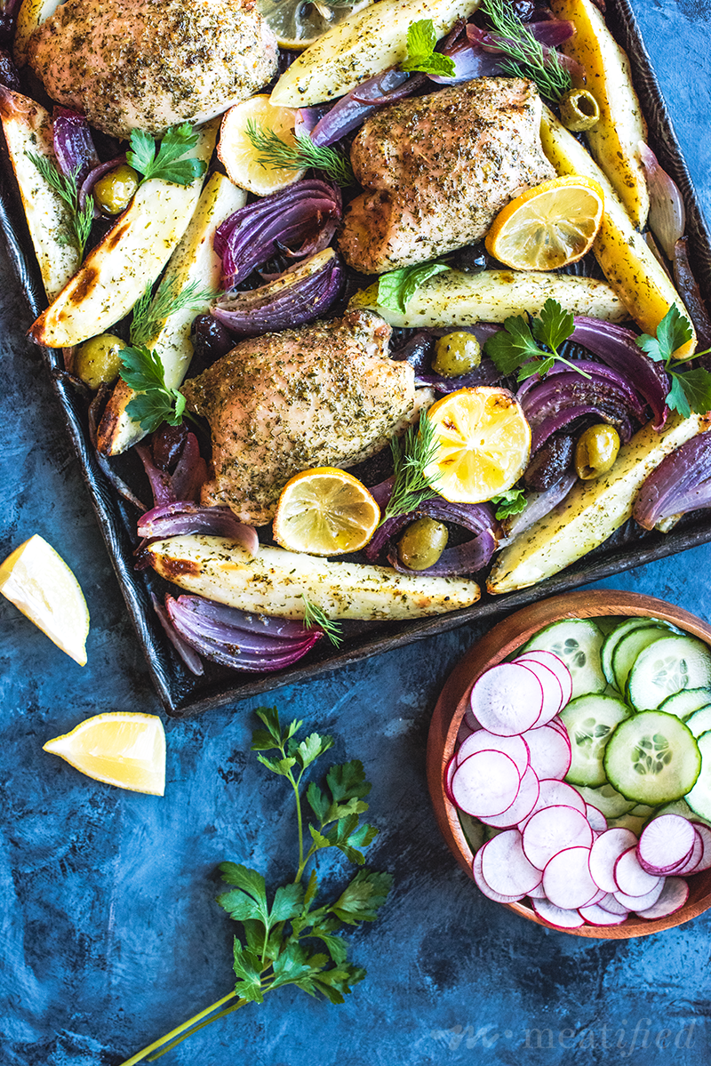 A simple yet vibrant seasoning takes this sheet pan Greek chicken recipe from https://meatified.com to "must make again" status, with lemony sweets, roasted red onions & briny olives.