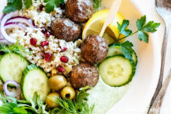 These easy Greek Meatball Bowls from https://meatified.com are a great way to level up your weeknight dinner or lunch with a speedy, vibrant take on classic Mediterranean flavors.