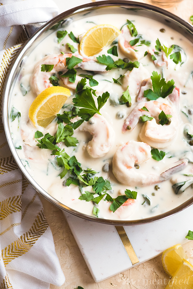 This dairy free cream sauce from https://meatified.com has the punchy flavors of piccata, paired with shrimp & spinach for a one pan meal that's perfect for date or week nights!