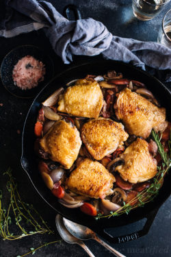 This simple braised white wine chicken from https://meatified.com is a lighter take on classic Coq Au Vin recipes, packed with vegetables & made with thighs for a speedier dinner.