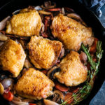 This simple braised white wine chicken from https://meatified.com is a lighter take on classic Coq Au Vin recipes, packed with vegetables & made with thighs for a speedier dinner.