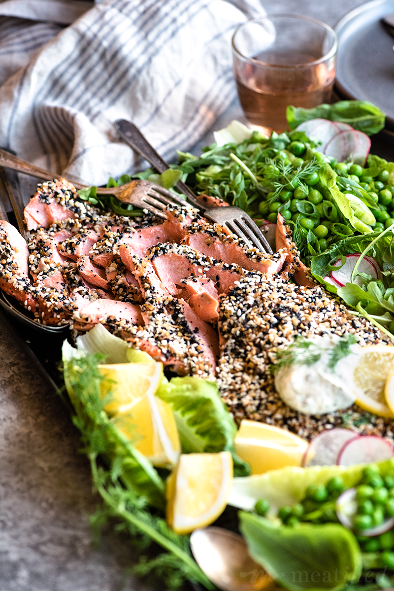 This everything bagel salmon is super simple, paired with a fun take on green salads and a silky caper sauce that brings everything together with a punch.