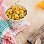 This take on Mexican street corn salad is made easily dairy free but with all the classic spicy, tangy & creamy flavors that make the dish so delicious!