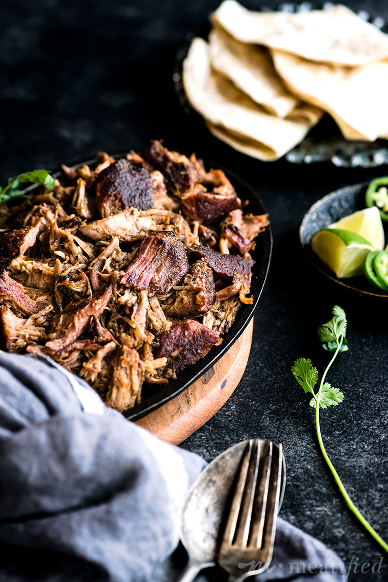 If you want the most tender, juicy taco meat with blistered, crispy edges, this smoked pork carnitas recipe delivers! It freezes & reheats beautifully, too.